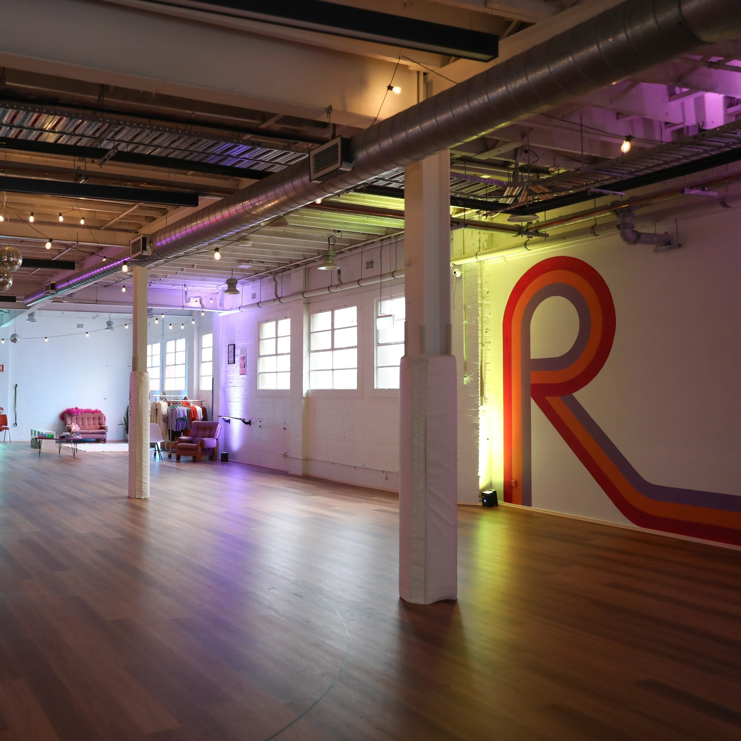 Venue Hire 7 RollerMart studio in Waterloo Sydney ready for venue hire with wooden floors, bespoke murals and lighting options